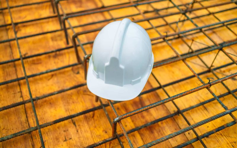 WHITE construction helmet at the construction site